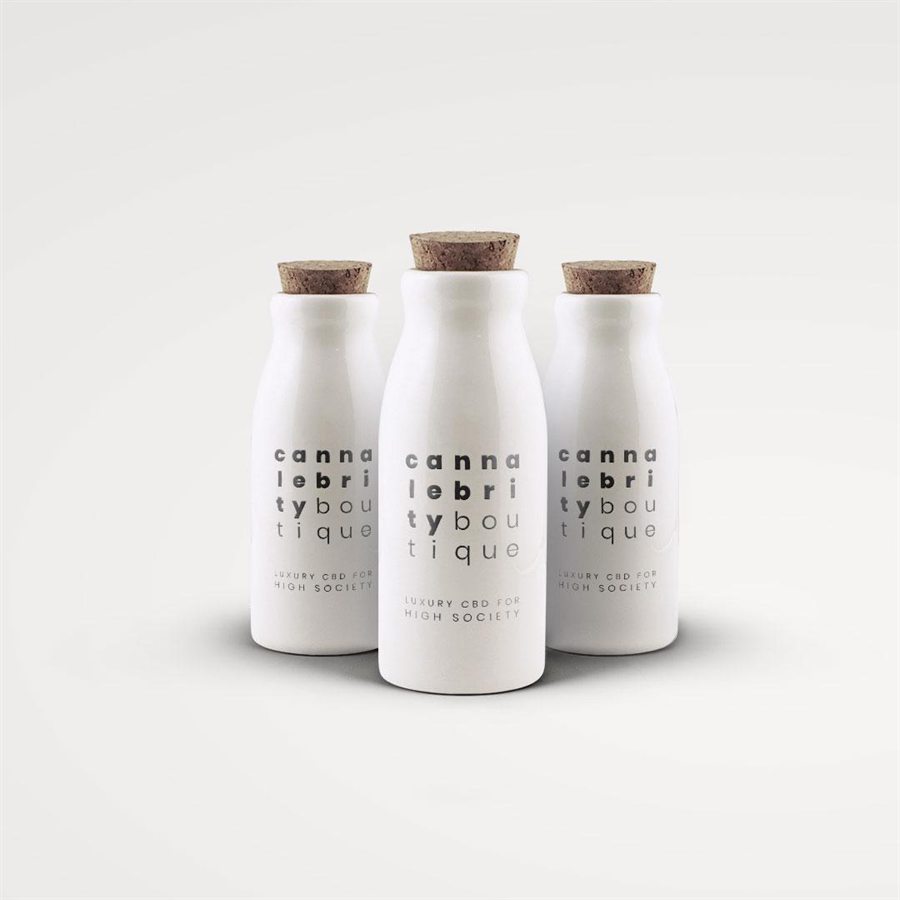 Three white Cannalebrity Boutique bottles