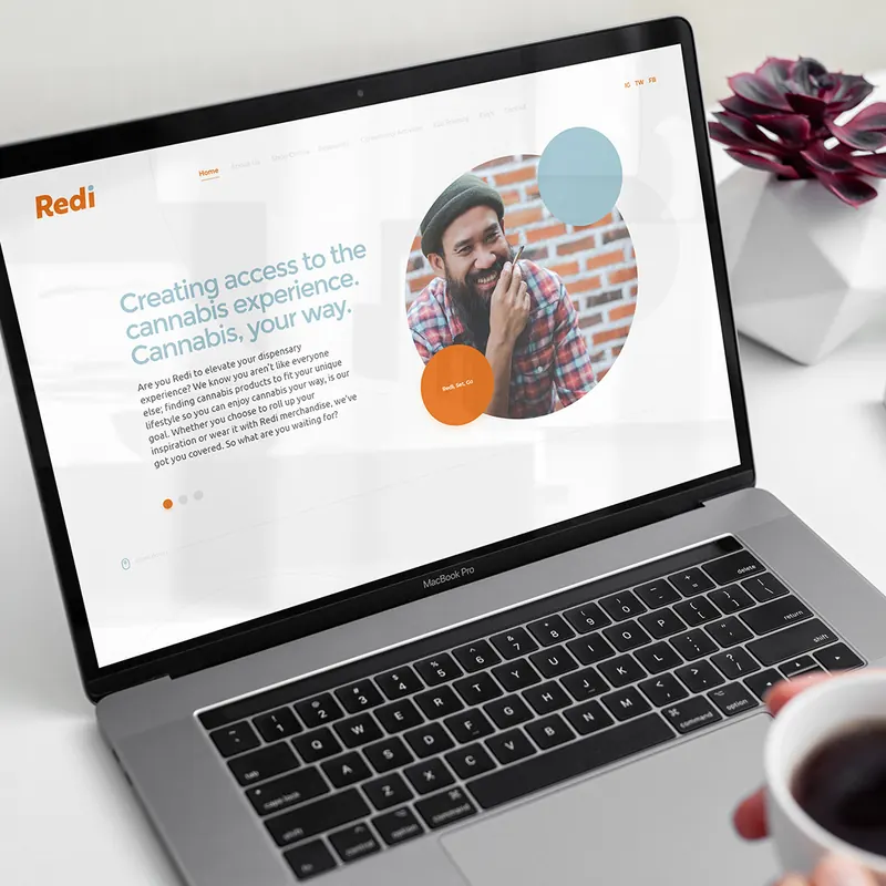 The Redi Dispensary website open on a laptop